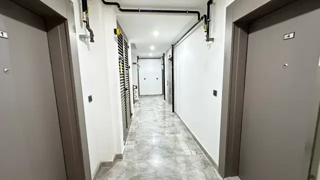 BARINAKLARDA DENİZE 100 M KAPALI OTOPARKLI SIFIR BİNA 2+1 DAİRE — görsel 6