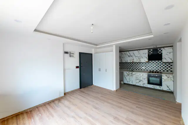 ERMENEK'TE BAHÇE KULLANIMLI İSKANLI GENİŞ 1+1 DAİRE — görsel 3