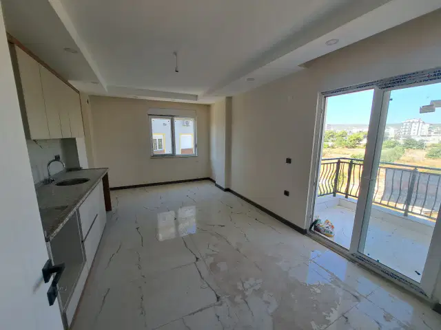 TRAMVAYA YÜRÜME MESAFESİNDE SIFIR 1+1 KİRALIK DAİRE — görsel 3