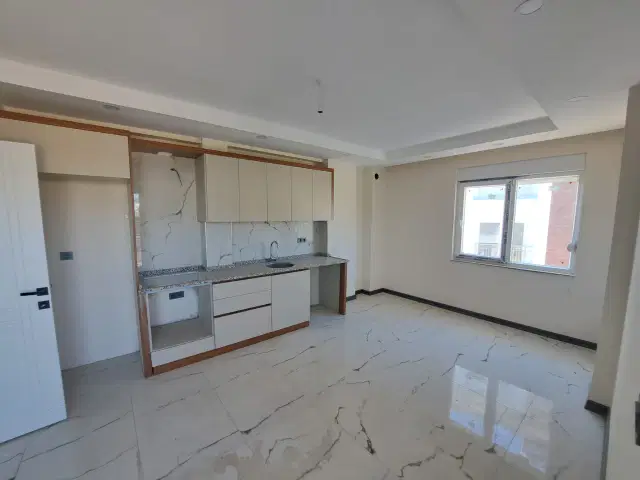 TRAMVAYA YÜRÜME MESAFESİNDE SIFIR 1+1 KİRALIK DAİRE — görsel 1