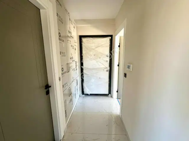 İskanlı Sıfır Binada 1+1 Satılık Daire — görsel 6